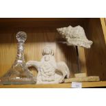 A CUT GLASS SHIPS DECANTER AND TWO SCULPTURES
