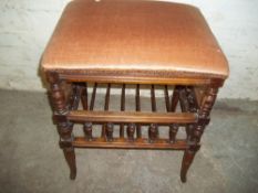 AN ANTIQUE STOOL WITH STRETCHER SHELF AND GALLERY UPRIGHT DESIGNE