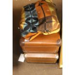 TWO SUITCASES AND A BLANKET