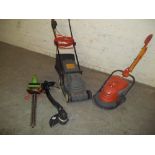 AN ELECTRIC FLYMO AND A BLACK AND DECKER ELECTRIC MOWER , A HEDGE TRIMMER AND A STRIMMER
