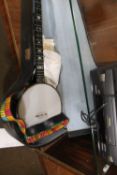 A VINTAGE CLIFFORD ESSEX AND CO BANJO WITH MOTHER OF PEARL INLAY