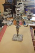 A WHITE METAL CANDLEABRA