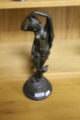 A BRONZE TYPE FIGURE OF A LADY WITH A CHERUB