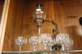 A WINE DISPENSER AND A SET OF 6E GLASSES