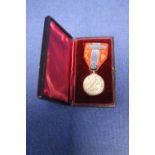 A CASED MEDAL