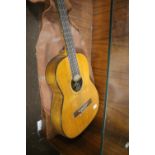 AN ANTIQUE TATRA ACOUSTIC GUITAR