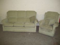 A 2 PIECE SUITE 3 SEATER AND A CHAIR