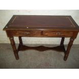 A MAHOGANY ANTIQUE LEATHER INLAID 2 DRAWER DESK