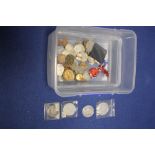 A TUB OF ASSORTED COINS