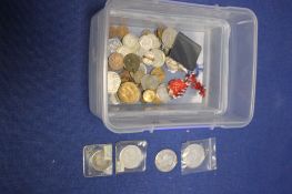 A TUB OF ASSORTED COINS