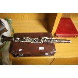 AN ANTIQUE ROSEWOOD CLARINET A/F