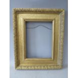 A 19TH CENTURY GOLD WATTS FRAME, with acanthus leaf design to outer edge, frame W 5 cm, rebate 40