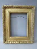 A 19TH CENTURY GOLD WATTS FRAME, with acanthus leaf design to outer edge, frame W 5 cm, rebate 40