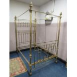 A LARGE VICTORIAN BRASS FRAMED HALF TESTER BED FRAME, with decorative wrought brass work, with