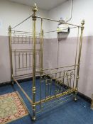 A LARGE VICTORIAN BRASS FRAMED HALF TESTER BED FRAME, with decorative wrought brass work, with