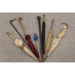 A SELECTION OF ASSORTED VINTAGE AND ANTIQUE PARASOLS AND WALKING STICKS (8)