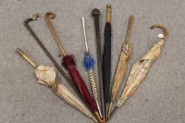 A SELECTION OF ASSORTED VINTAGE AND ANTIQUE PARASOLS AND WALKING STICKS (8)