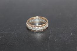 A HALLMARKED 9CT GOLD DIAMOND SET ETERNITY RING, approximate weight 3.2 g, ring size O