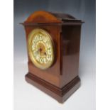 A FRENCH MAHOGANY AND INLAID MANTEL CLOCK, the circular dial with Arabic numerals and reticulated