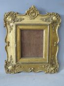 A 19TH CENTURY DECORATIVE GILT MINIATURE FRAME, glazed, frame W 7 cm, rebate 13.5 x 11.5 cm