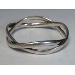 GEORG JENSEN. A George Jensen heavy crossover style bangle, approx Dia. 7.1 cm, stamped Georg