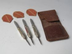A SET OF THREE SILVER MOUNTED DARTS - BIRMINGHAM 1938, in leather case with cardboard flights