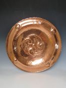 AN ARTS AND CRAFTS COPPER 'NEWLYN' STYLE CHARGER, Dia. 52.5 cm