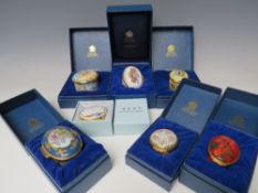 A COLLECTION OF SEVEN HALCYON DAYS ENAMEL PILL BOXES, comprising a limited edition 'Gilbert and