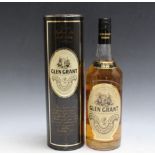 1 LITRE BOTTLE OF GLEN GRANT HIGHLAND MALT WHISKY IN GIFT TIN WITH DUTY FREE EXPORTATION LABEL