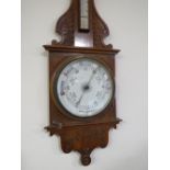 A LARGE EARLY 20TH CENTURY CARVED OAK ANEROID BAROMETER, H 106 cm