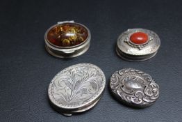 A SELECTION OF FOUR SILVER AND WHITE METAL PILL BOXES