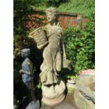 A LARGE 20TH CENTURY STONE FEMALE GARDEN STATUE, with an urn in one hand and a basket of fruit in