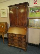 A GEORGIAN MAHOGANY BUREAU BOOKCASE. H 212 cm, W 101 cm