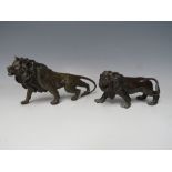 A 20TH CENTURY FINELY CAST BRONZE FIGURE OF A LION, approx L 20 cm, together with a smaller