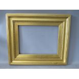 A 19TH CENTURY GOLD FRAME, with decoration to inner edge and gold slip, frame W 6.5 cm, slip