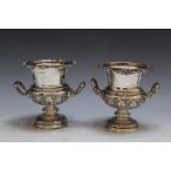 A SMALL PAIR OF HALLMARKED SILVER TWIN HANDLED TABLE TOP CAMPANA URNS BY LEE & WIGFALL - SHEFFIELD