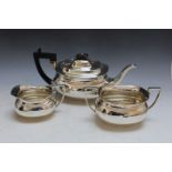 A HALLMARKED SILVER THREE PIECE TEA SERVICE BY COOPER BROTHERS & SONS LTD - SHEFFIELD 1915, approx