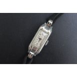 ROLEX - AN SLIMLINE ART DECO 18CT WHITE GOLD 'PRINCESS' WRIST WATCH, W 1.25 cm