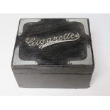 AN EDWARDIAN SILVER MOUNTED EBONISED CIGARETTE BOX, with hinged lid, Birmingham 1903, L 11 cm