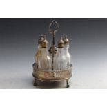 A GEORGIAN HALLMARKED SILVER FIVE BOTTLE CRUET STAND - LONDON 1774, A/F with many faults, damage