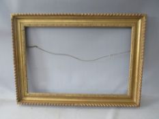 AN EARLY TO MID CENTURY GOLD FRAME WITH DESIGN TO INNER EDGE, leaf design to outer edge, frame W 8.5