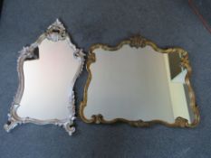 A 20TH CENTURY ORNATE CARVED WOODEN SILVERED FRAMED MIRROR, 59 x 39 cm (widest), together with a