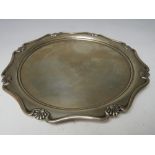 A HALLMARKED SILVER SALVER - SHEFFIELD 1911, with engraved dedication to reverse, approximate weight