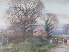 HENRY CHARLES FOX (1860-1925). A rural wooded landscape with cattle and drover on lane, farmstead in