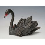 AN AUSTRIAN COLD PAINTED MODEL OF A BLACK SWAN AND CYGNET STAMPED GESCHUTZT, W 13.5 cm, H 9.5 cm