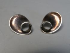 GEORG JENSEN. A pair of George Jensen Torun elliptical style earrings, stamped Georg Jensen,