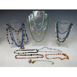 A COLLECTION OF VINTAGE AND GLASS BEAD NECKLACES, to include satin glass, malachite and filigree