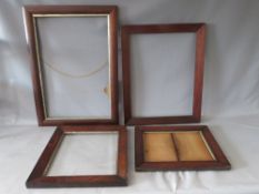 THREE 19TH CENTURY ROSEWOOD PICTURE FRAMES, together with a mahogany picture frame, average frame