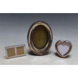 THREE SMALL SILVER PICTURE FRAMES