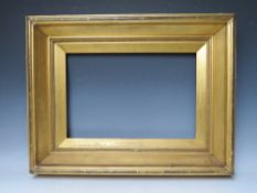 A 19TH CENTURY GOLD FRAME, with gold slip and egg and dart design to inner edge, frame W 9 cm,